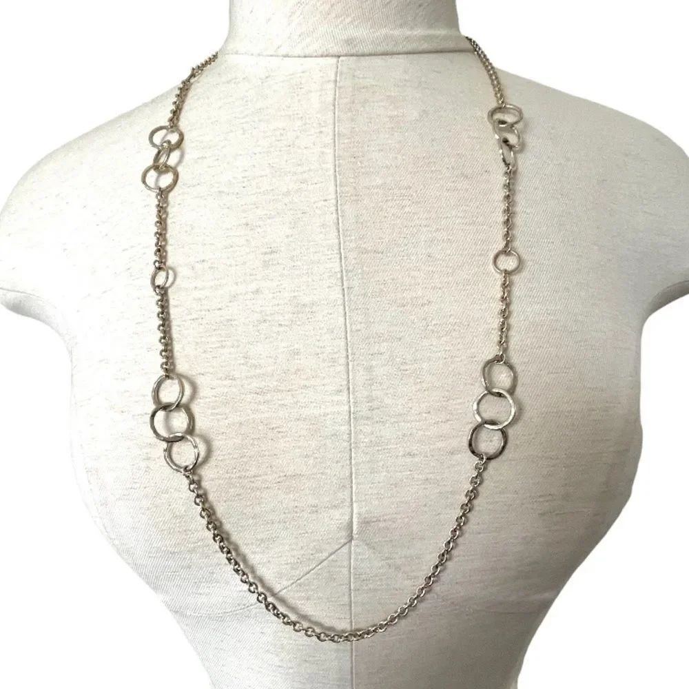 Long silver tone necklace with circles
